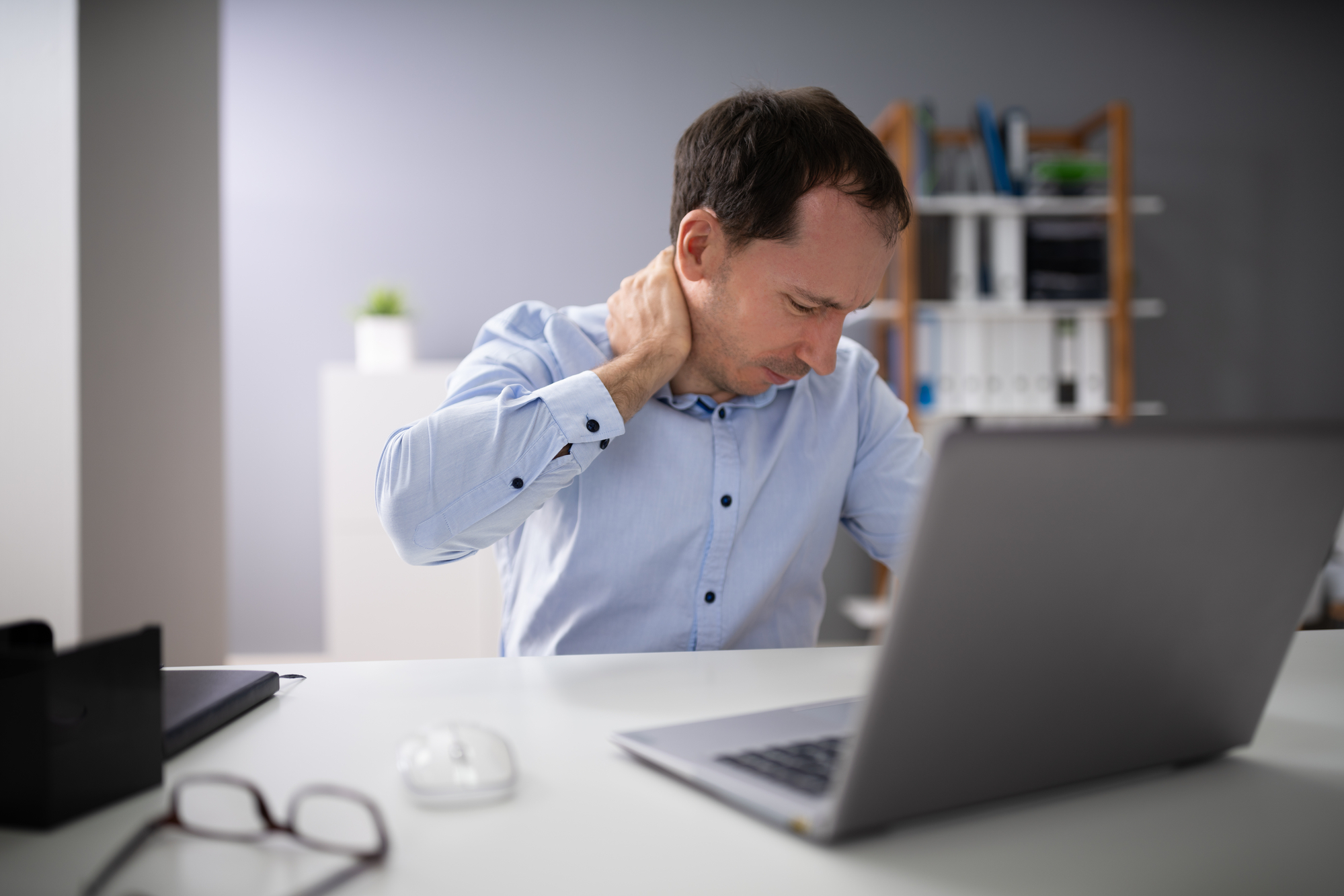 Businessman Having Neck Pain